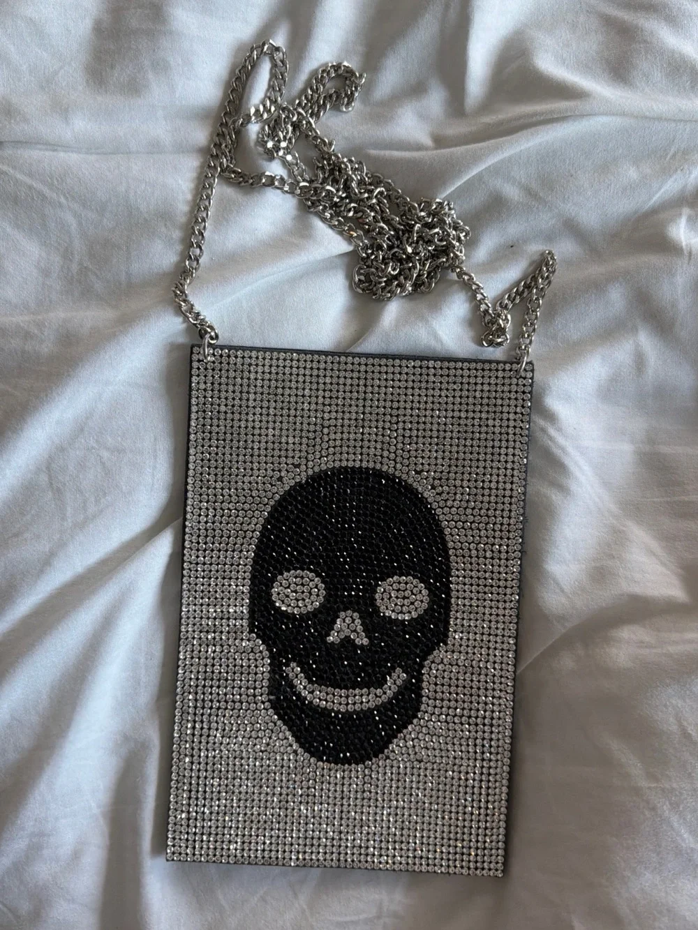 Edgy, rhinestone skull crossbody bag